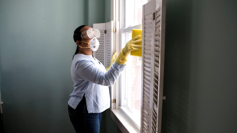 HVAC technician servicing home climate system